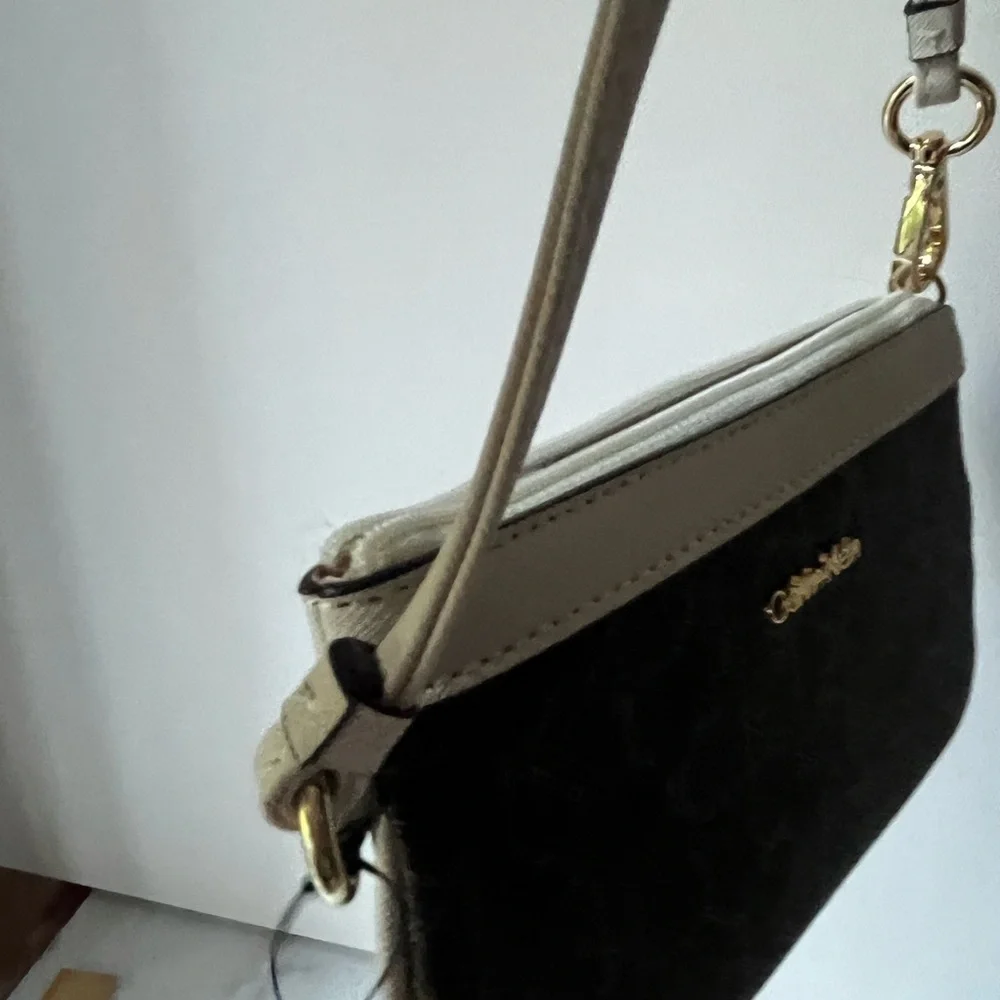 Calvin Klein wristlet wallet brown logo